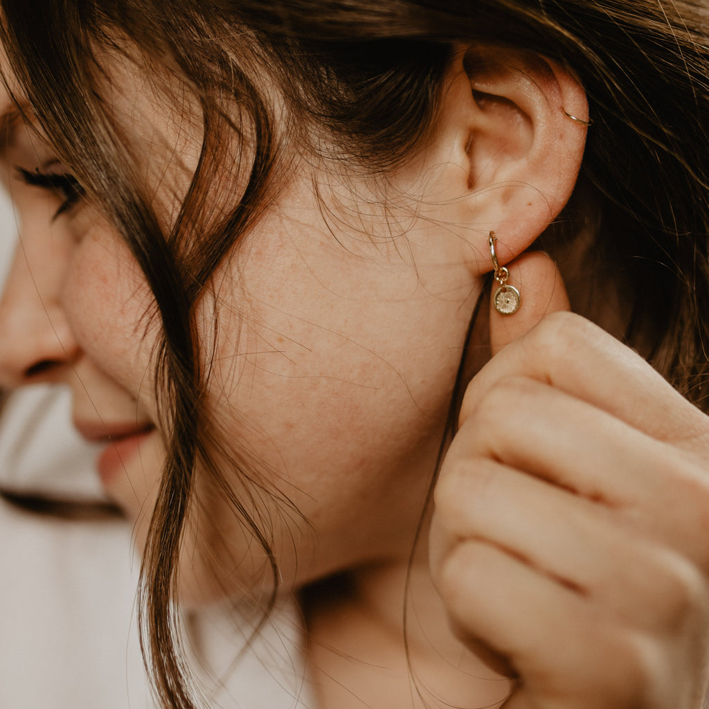 gold hoop charm earrings gold on model